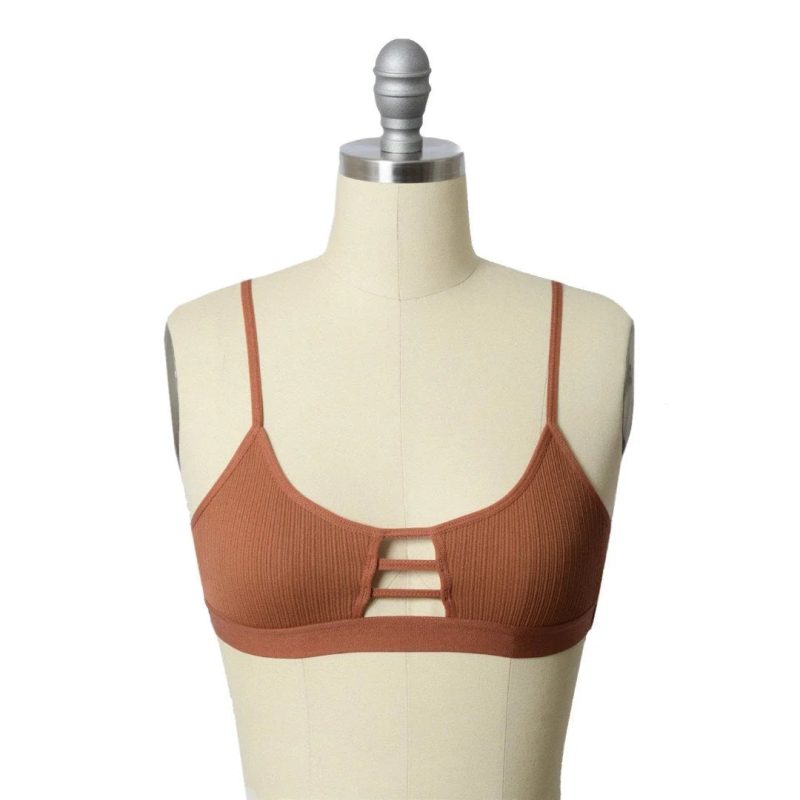 Close up of a mannequin torso wearing a Daisy Lane Horizontal Strap Bralette