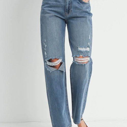 Distressed baggy skater jeans with ripped knees and a straight-leg cut