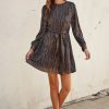 Metallic pleated long-sleeve mini dress with a tie waist belt from Shop Daisy