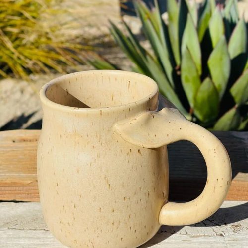 16 OZ Stoneware Mug with Whale Tail Handle on a Wooden Table for Stylish Enjoyment