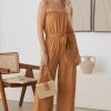 Strapless caramel jumpsuit with wide-leg pants and boho smocked neck line design