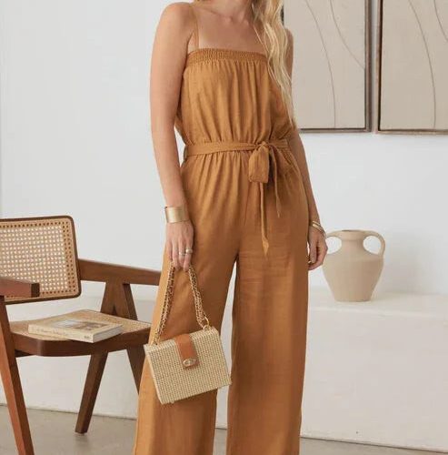 Strapless caramel jumpsuit with wide-leg pants and boho smocked neck line design