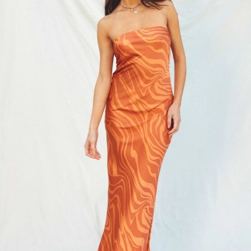 Strapless orange bias cut maxi dress featuring a textured pattern for a boho look