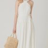 White halter-neck midi dress with gathered waist for a flowy boho chic style