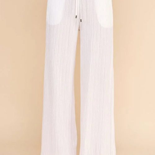 White textured woven adjustable tie waist pants with a drawstring for stylish comfort