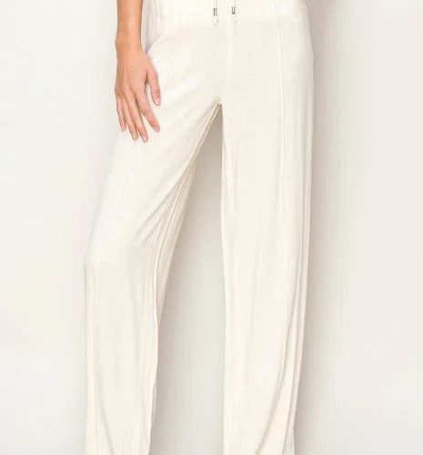 White woven textured wide leg pants with a drawstring waist for stylish comfort