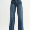 Wide-leg blue denim mid rise jeans with light stretch in a straight cut silhouette